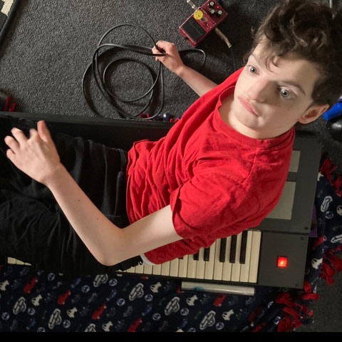 A young music therapy patient